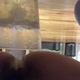 A very cute girl squats and pees into a clear cup. Peeing only. Filmed from a POV perspective. Vertical format video. About a minute.